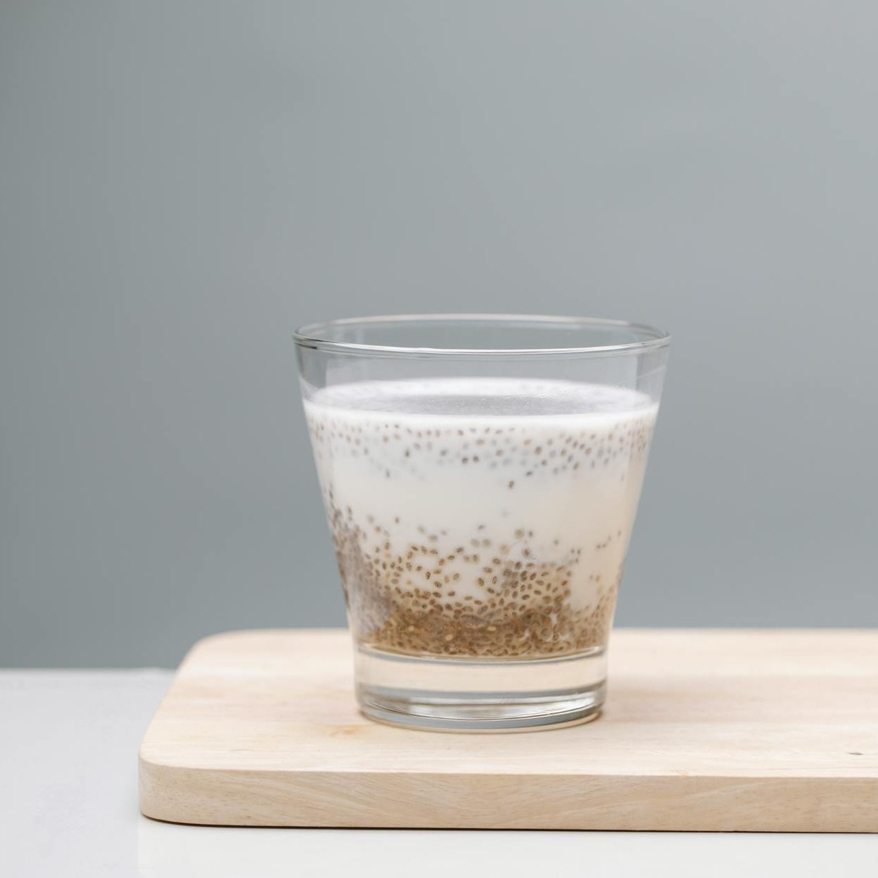 glass of tasty pudding with chia seeds